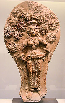 Yakshi under a flowering asoka tree. Sunga, 2nd-1st century BC, India